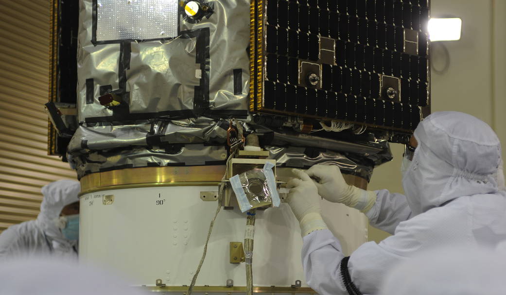 OCO-2 NASA engineers put the final touches to the satellite
