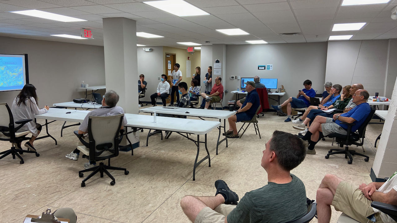 A picture of forecasting and flight planning meeting on the morning of 15 July 2021. I am sitting in the front left corner (my back facing the camera), leading the meeting. Photo credit: Dan Chirica