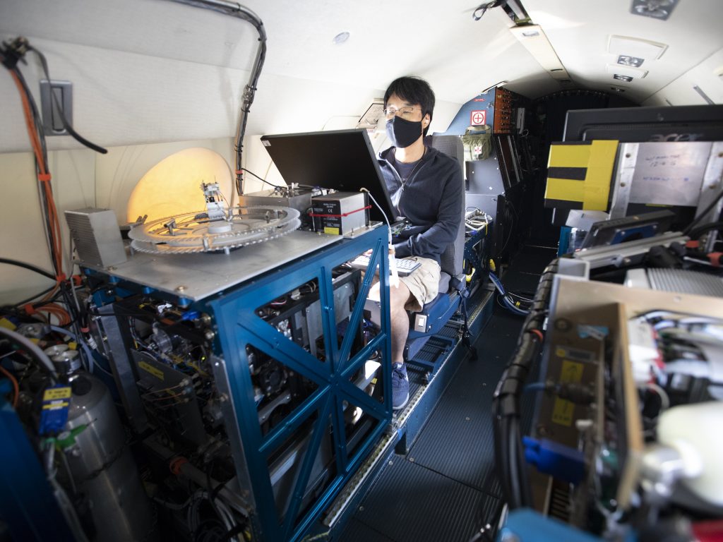 Masks are part of the safety protocol for ACTIVATE scientists. Here, Yonghoon Choi prepares for a science flight on the HU-25 Falcon. Credits: NASA/David C. Bowman